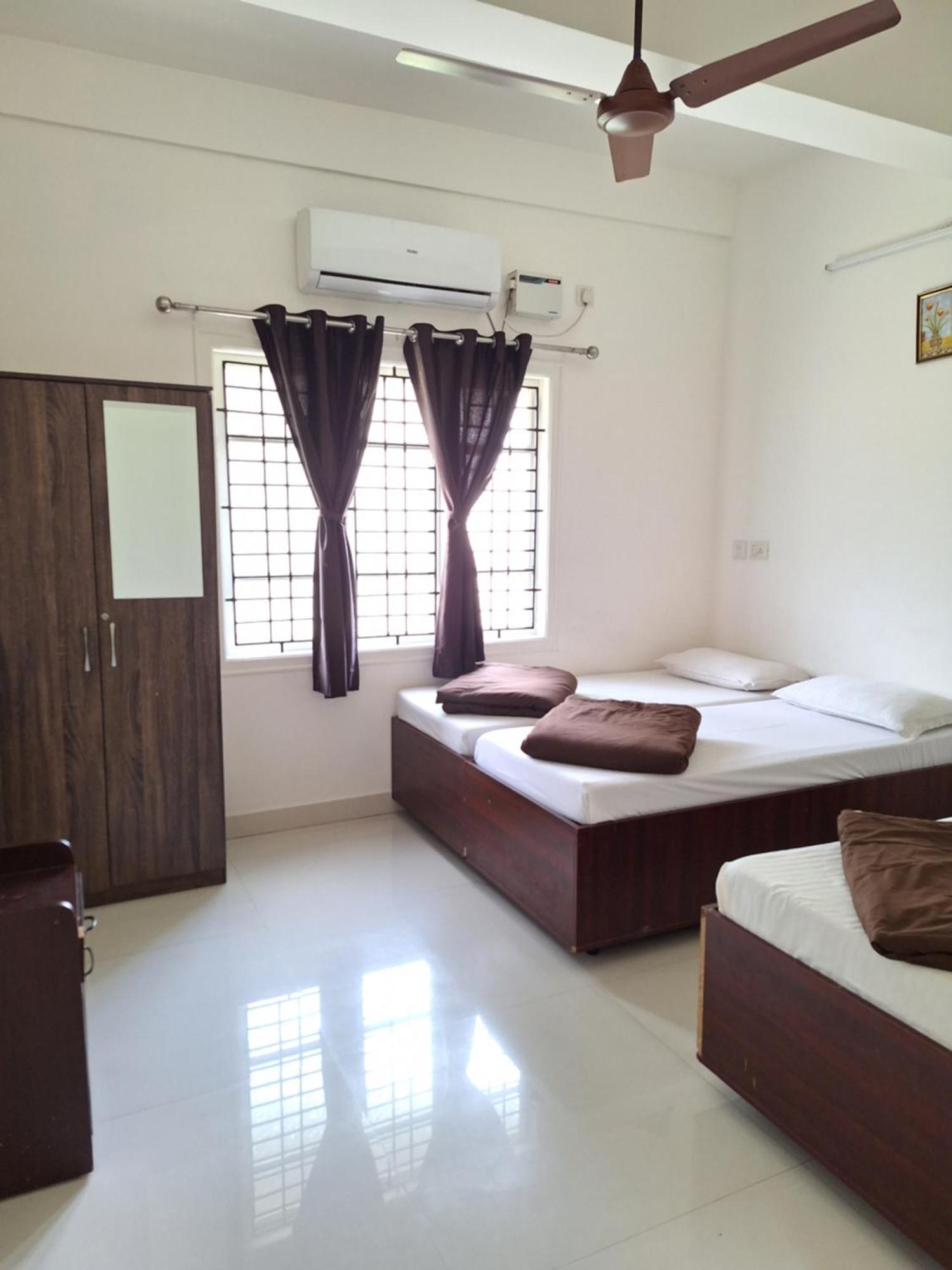 Suvarna Grande Homes Mangalore Quarto foto
