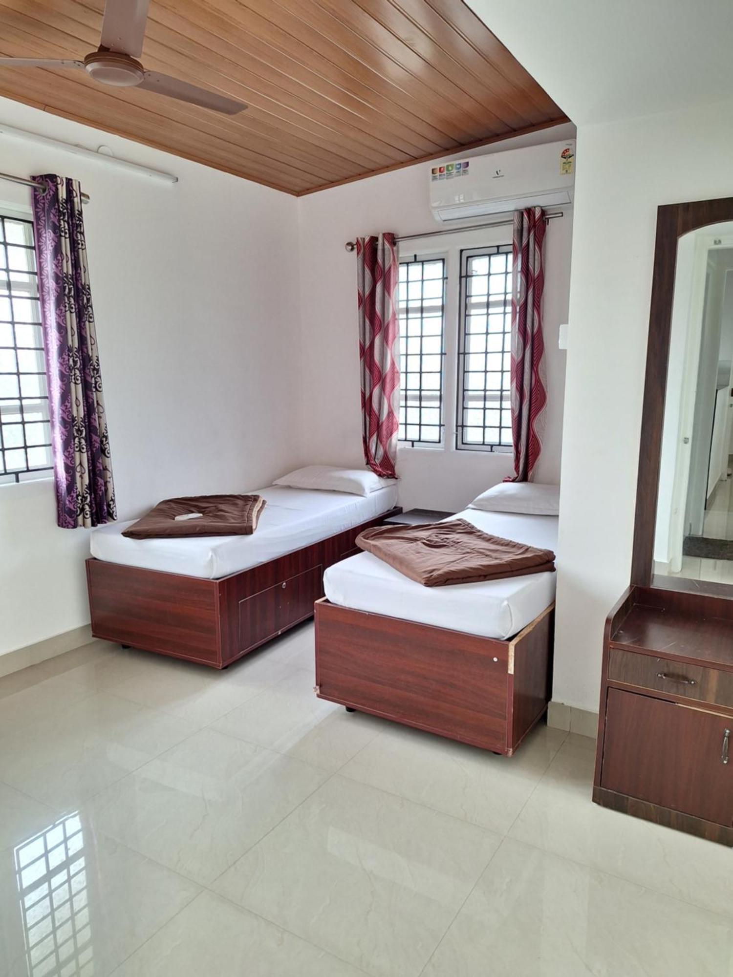 Suvarna Grande Homes Mangalore Quarto foto